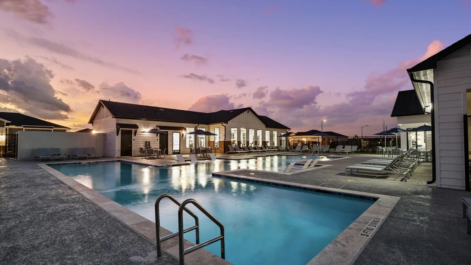 Twilight Cypress exterior pool amenity photo. interior photo of Yardly cypress gym of treadmills and bikes. blue sunny sky outside by pool. New pet-friendly apartment homes for rent with private fenced backyards Arizona, Texas, Florida, and North Carolina with pool, pickleball, dog park, gym, clubhouse and gated community. *No breed or weight restrictions.